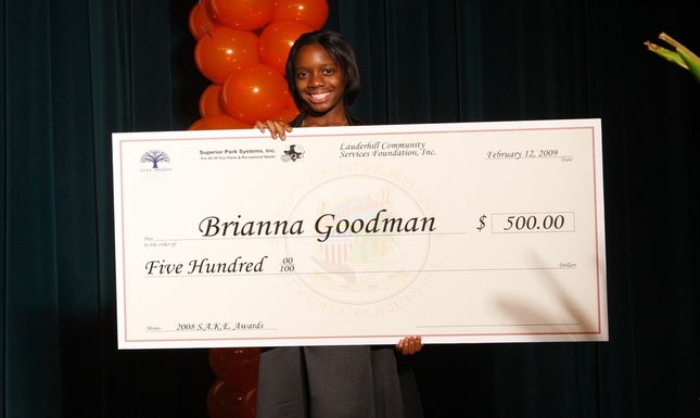 Brianna Goodman with Check