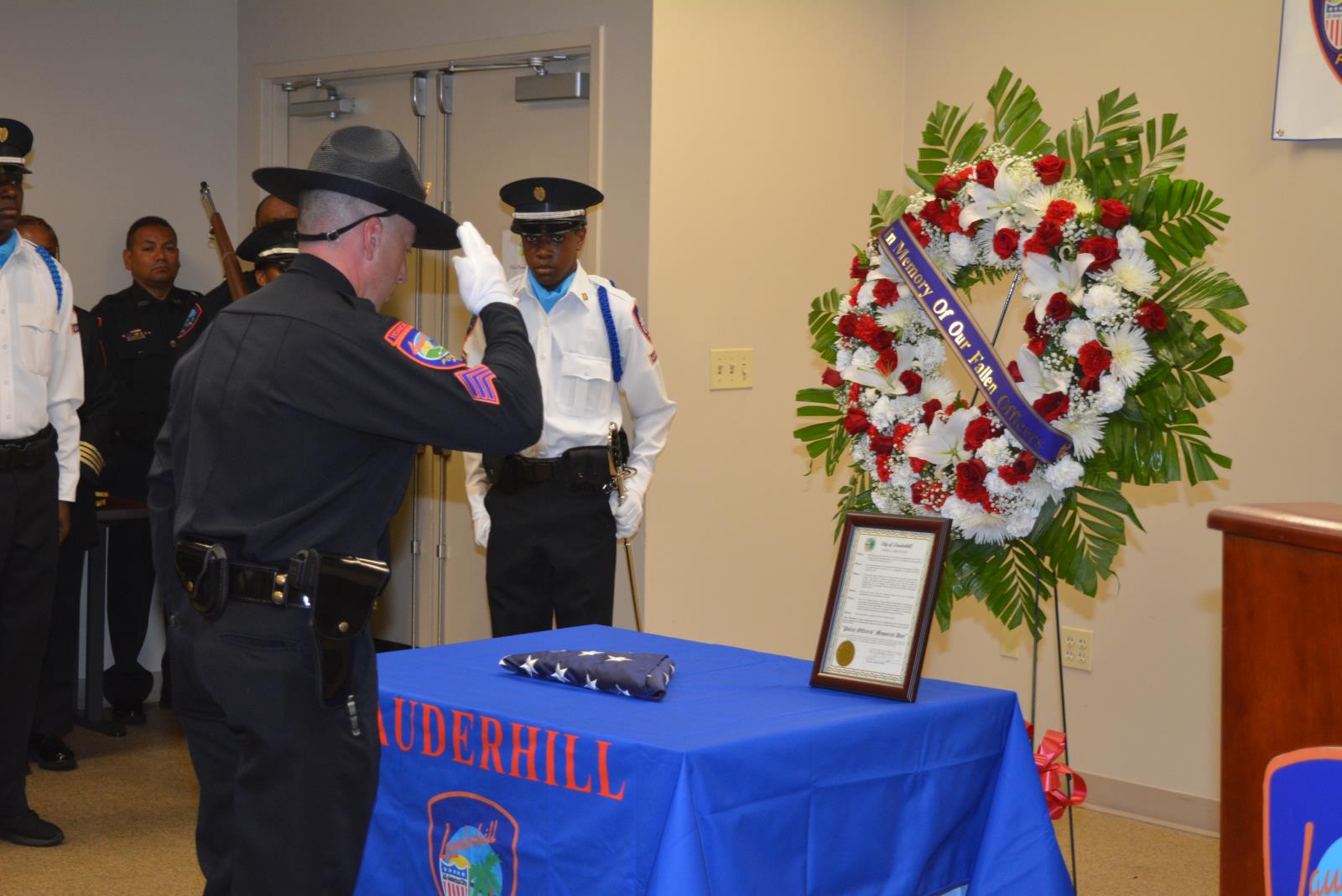 Officer saluting the flag