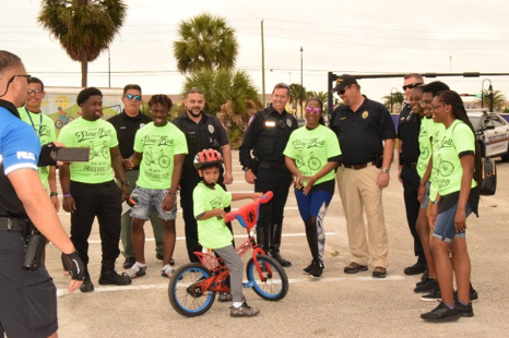 LPD Officers and participating kids having a good time during Final Slow Roll event