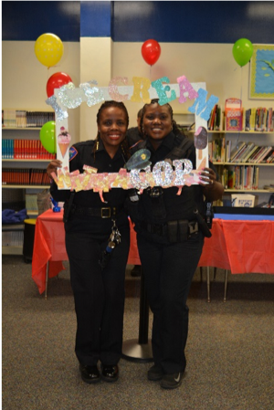 Police Officers posing for a picture during Ice Cream with a Cop Frame