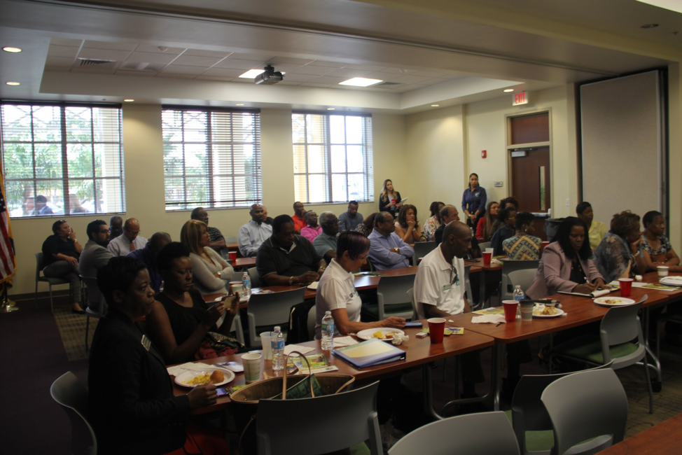 Lauderhill business owners enjoying lunch and sharing ideas